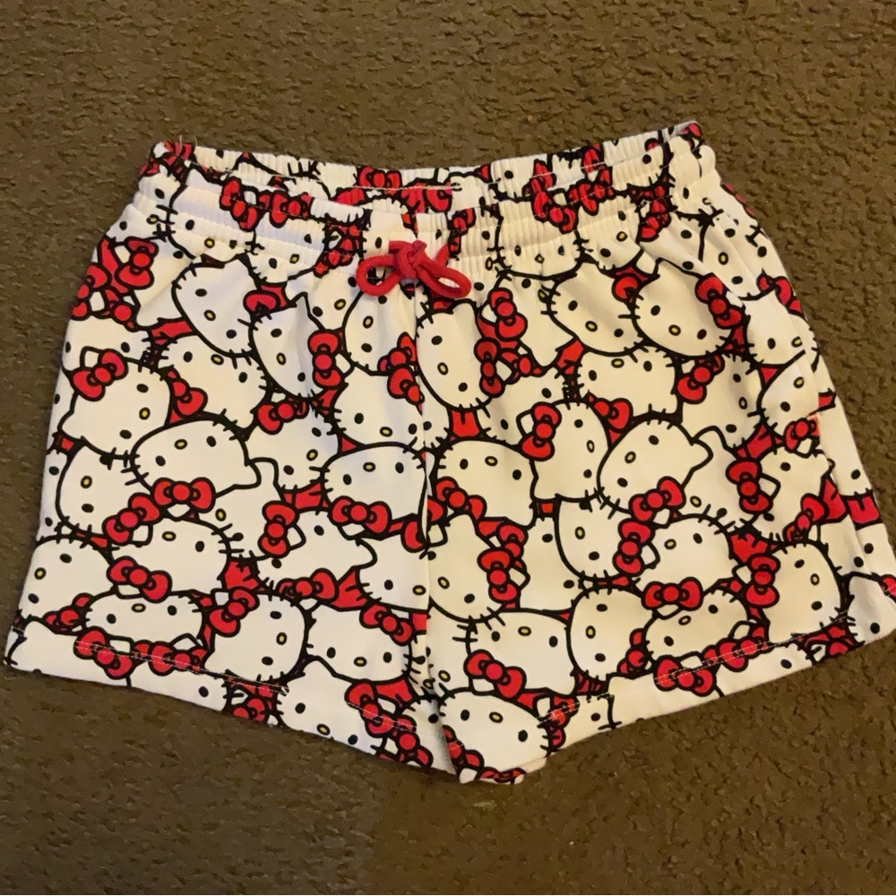 Hello Kitty red and white graphic lounge shorts with drawstring waistband.